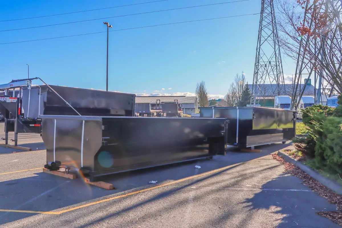 Roll-off dumpster ready for waste disposal at job site for Concrete Dumpster Rental in Findlay